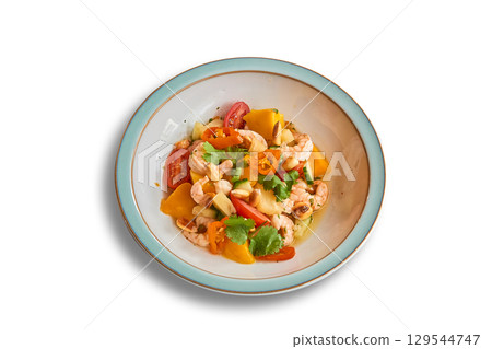 Ceviche pineapple, Mango and shrimps in bowl isolated on white Ceviche pineapple, Mango and shrimps in bowl isolated on white 129544747