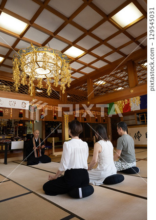 Pilgrims listening to a sermon at Iwaya-ji Temple, Chita, Aichi Prefecture 129545031