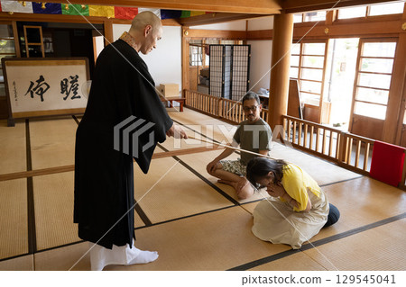 Pilgrims listening to a sermon at Iwaya-ji Temple, Chita, Aichi Prefecture 129545041