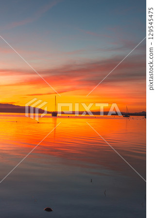 Dramatic sunset over Lake Constance, Allensbach, Germany 129545475