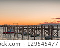 Sunset over a wooden jetty in Allensbach, Lake Constance, Germany 129545477
