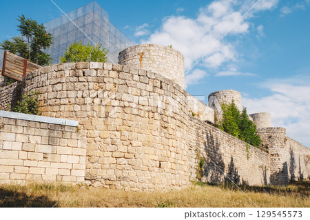 walls and towers of Burgos Castle with metal frame 129545573