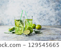 Lime Lemonade with thyme and ice. 129545665