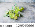 Lime Lemonade with thyme and ice. 129545666