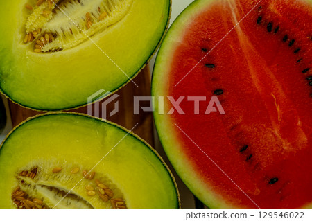 Sliced melon and watermelon close-up Sliced melon and watermelon close-up 129546022