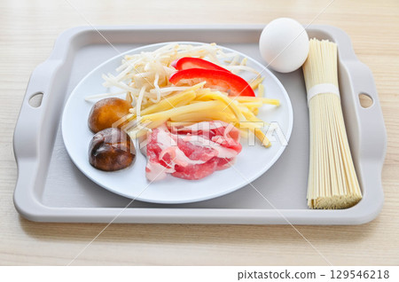 Hot and sour instant ramen noodles 129546218