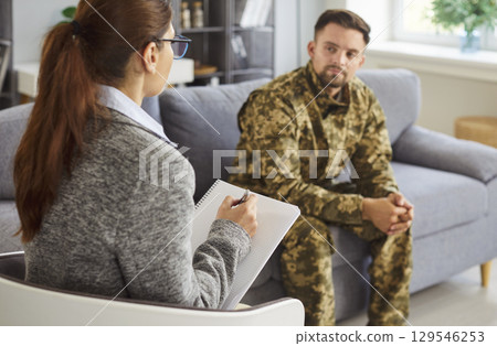 Psychologist Conducting Therapy For Veteran 129546253