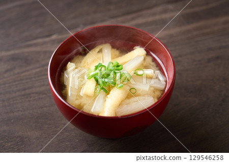 Miso soup with radish and fried tofu 129546258