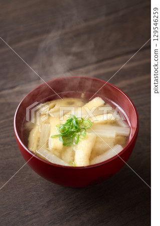 Miso soup with radish and fried tofu 129546259