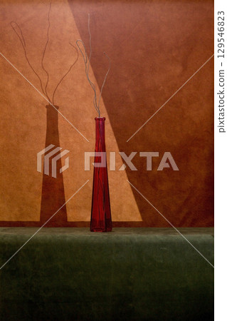 Surrealistic Still Life with a red bottle and shadows "Fallen leaves". Minimalism Surrealistic Still Life with a red bottle and shadows "Fallen leaves". Minimalism 129546823