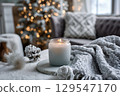 Candle flame and soft blanket (AI-generated image) 129547170