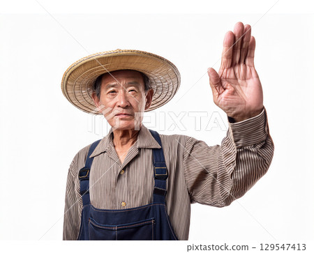 A man raising his hand (agricultural worker image) 129547413