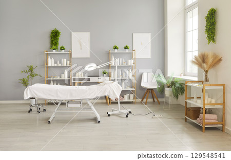Room interior of beautician and cosmetologist salon for beauty spa treatment, skin therapy, massage 129548541