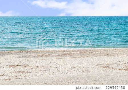 Green sea, white sand and blue sky Green sea, white sand and blue sky 129549458
