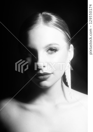 Beautiful woman black and white classic studio portrait 129550174