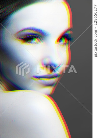 Woman portrait with classic hairstyle, naked shoulder in RGB color split effect style Woman portrait with classic hairstyle, naked shoulder in RGB color split effect style 129550177
