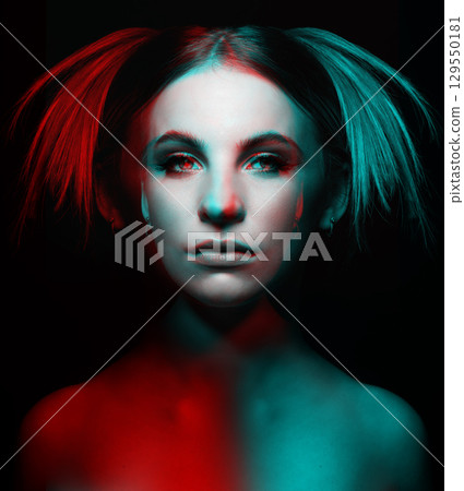 Beautiful woman portrait with classic hairstyle in RGB color split effect style 129550181