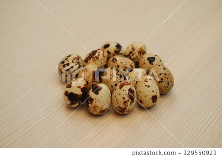 Fresh Quail Eggs on Wooden Table Fresh Quail Eggs on Wooden Table 129550921