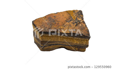 Tiger's eye with beautiful natural patterns, raw stone, white background Tiger's eye with beautiful natural patterns, raw stone, white background 129550960