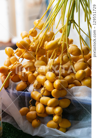 Fresh yellow date palm ready for market 129551729