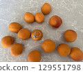 Fresh apricots arrangement with oval diamond ring 129551798