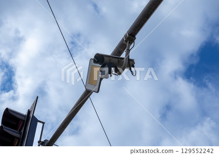 CCTV camera mounted on a street pole for urban traffic monitoring and enhancing public safety within modern smart city infrastructure 129552242
