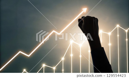Business growth is represented by hand reaching upward towards glowing graph symbolizing success and progress 129554423