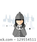 Cozy winter scene: woman sipping hot beverage in snowy landscape 129554511