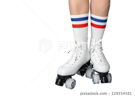 White roller skates with striped socks on female legs White roller skates with striped socks on female legs 129554581