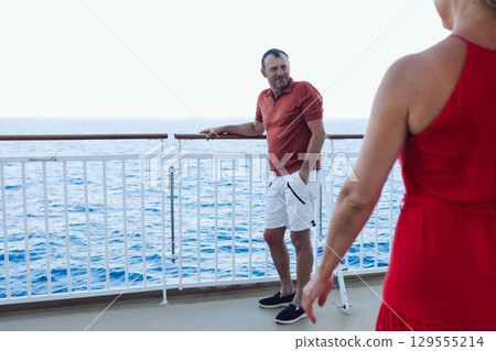 Married couple on cruise ship. Attractive couple on deck with cruise ship. High quality photo Married couple on cruise ship. Attractive couple on deck with cruise ship. High quality photo 129555214