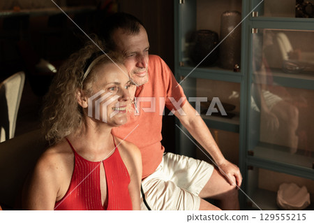 Couple in love on cruise ship. Man and woman in love enjoying their romantic vacation. High quality photo Couple in love on cruise ship. Man and woman in love enjoying their romantic vacation. High quality photo 129555215