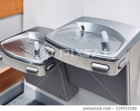 A two-section wall-mounted water cooler designed for wheelchair users A two-section wall-mounted water cooler designed for wheelchair users 129555290
