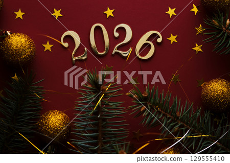 New Year 2025 red background. Number of the coming year in Christmas decoration. 129555410