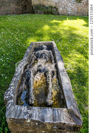 A coffin art at the Jardim dos Colegiais in the old Town of Evora, Alentejo in Portugal. 129555864
