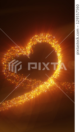 Sparkling golden particles forming a glowing heart shape on a warm radiant background 129557560
