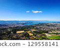 View of Geneva city and its surroundings from the top of Mount Saleve. 129558141