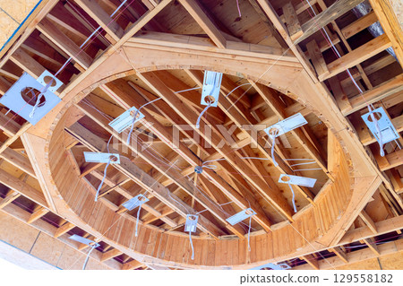 Construction of circular wooden ceiling structure with electrical wiring details Construction of circular wooden ceiling structure with electrical wiring details 129558182
