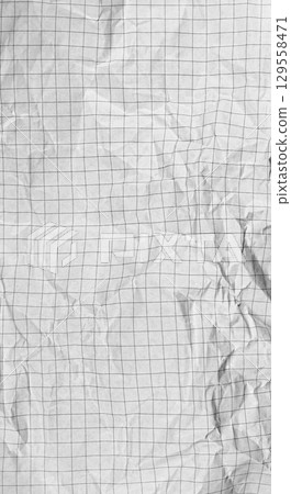 Crumpled Checkered Paper with Dotted Lines on White Background for Creativity Crumpled Checkered Paper with Dotted Lines on White Background for Creativity 129558471
