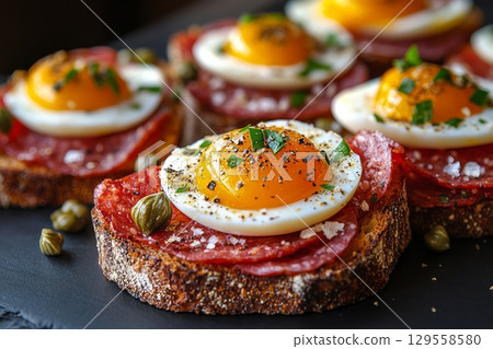 Tasty Open-Faced Sandwiches With Soft-Boiled Eggs for the Perfect Brunch Experience. 129558580