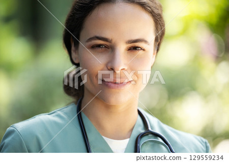 Portrait of a young pretty female doctor looking confident 129559234