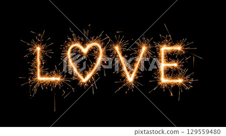Sparkling love displayed through bright fireworks on a dark backdrop during a night celebration 129559480
