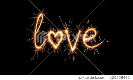 Sparkling love written in lights during a nighttime celebration with joyful energy and creativity 129559481
