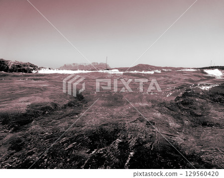 red mountain peak in the evening 129560420