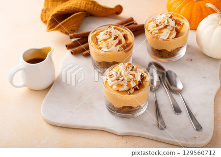 Pumpkin cheesecake in a glass, fall dessert idea, no bake Thanksgiving dessert Pumpkin cheesecake in a glass, fall dessert idea, no bake Thanksgiving dessert 129560712