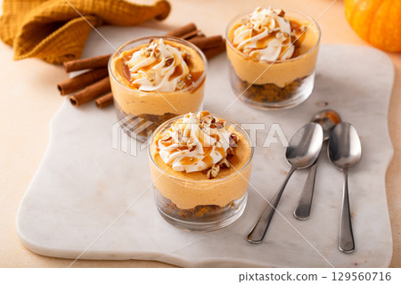 Pumpkin cheesecake in a glass, fall dessert idea, no bake Thanksgiving dessert Pumpkin cheesecake in a glass, fall dessert idea, no bake Thanksgiving dessert 129560716