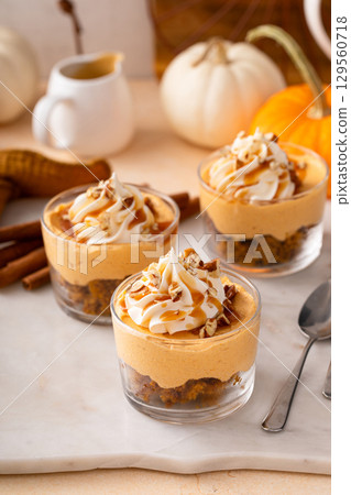 Pumpkin cheesecake in a glass, fall dessert idea, no bake Thanksgiving dessert Pumpkin cheesecake in a glass, fall dessert idea, no bake Thanksgiving dessert 129560718