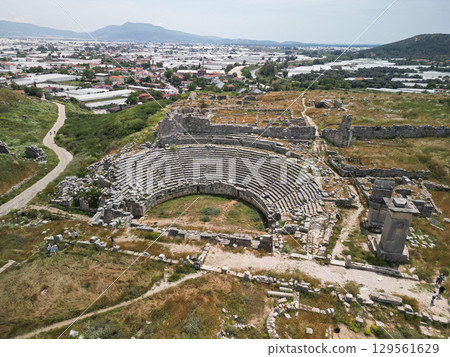 Aerial view of Tlos amphitheatre and fields overlooking Fethiye plain, Turkiye Aerial view of Tlos amphitheatre and fields overlooking Fethiye plain, Turkiye 129561629