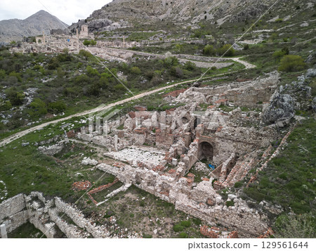 Aerial view of ancient Sagalassos ruins on mountainous hillside in Turkey Aerial view of ancient Sagalassos ruins on mountainous hillside in Turkey 129561644