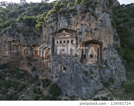Ancient Lycian rock tombs carved into cliffs near Dalyan in Turkey Ancient Lycian rock tombs carved into cliffs near Dalyan in Turkey 129561724