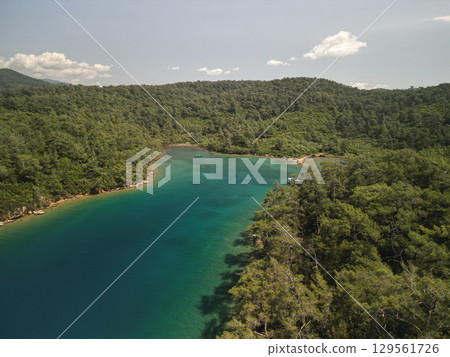 Serene turquoise pine cove on the Aegean coast near Gocek, Mugla, Turkey 129561726